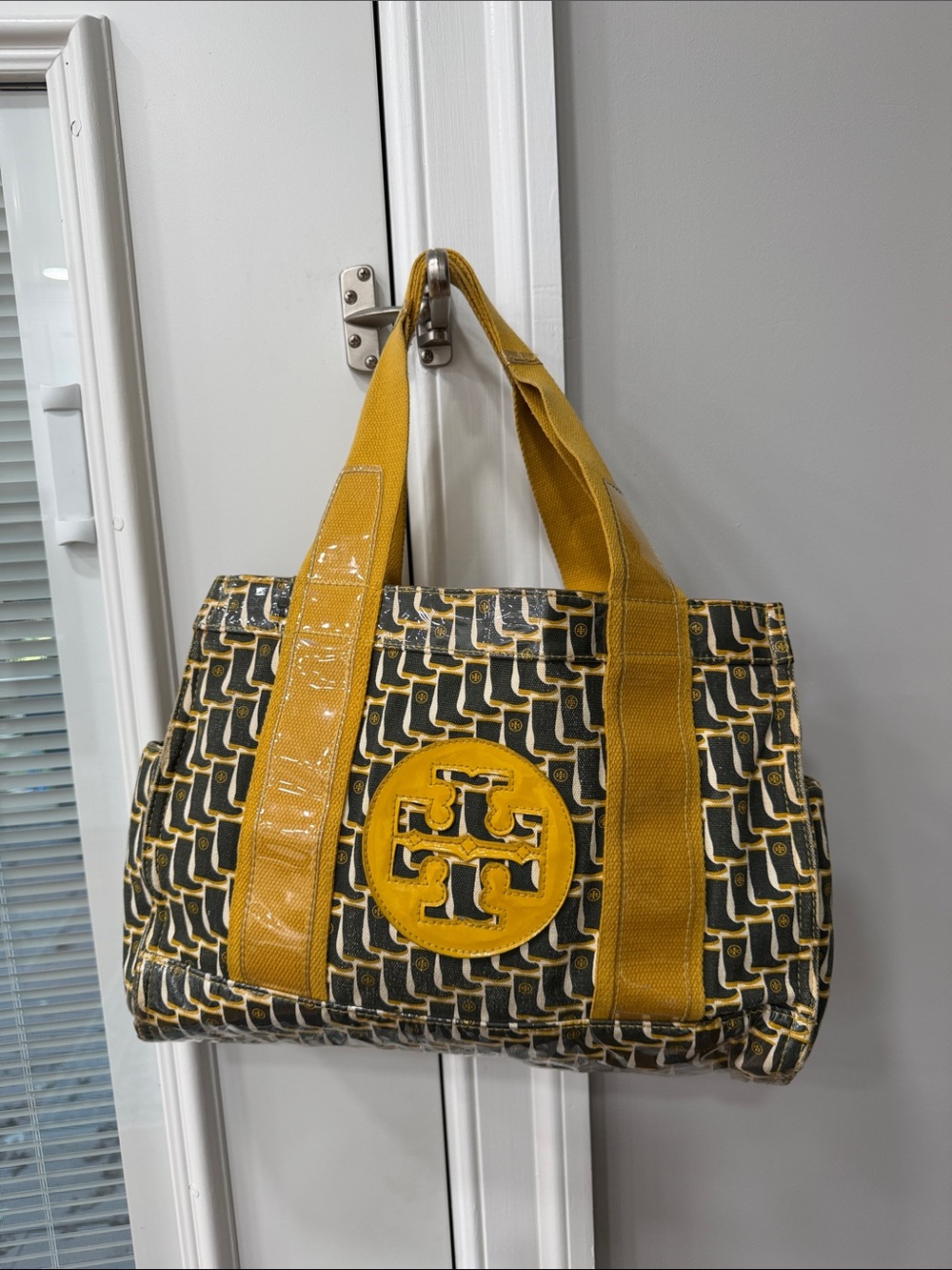 Vintage Tory Burch bag with rain boot pattern